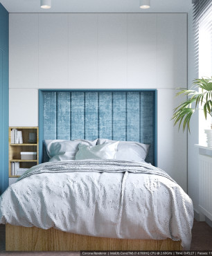 Sypialnia z niebieskim kolorem ścian ze sztukateria oraz zabudowanymi szafkami nad łóżkiem