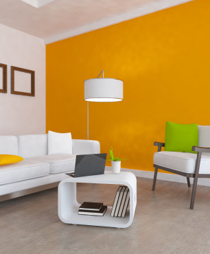 Aranżacja salonu z pomarańczową ścianą