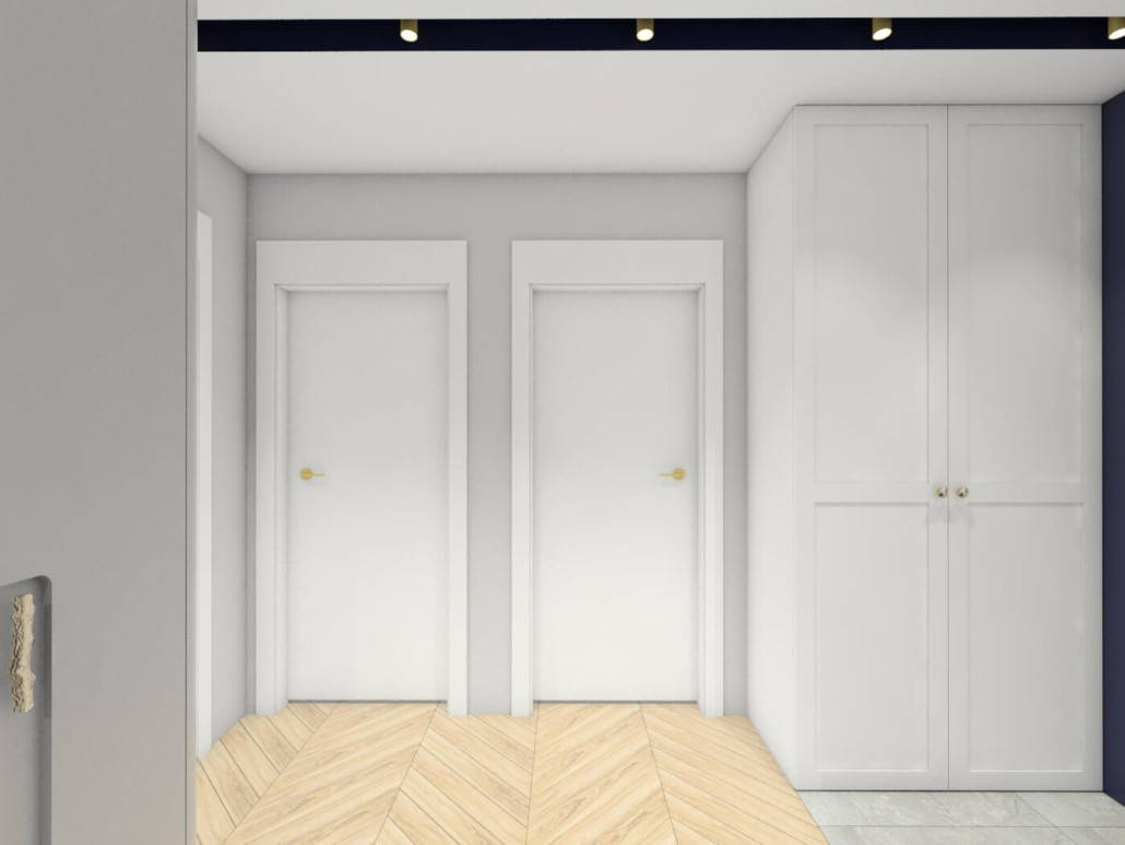 Klasyczny korytarz na piętrze domu jednorodzinnego z szafą z białymi frontami