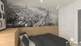 Pokój młodzieżowy z tapetą przedstawiającą panoramę dużego miasta