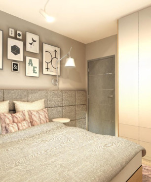 Projekt sypialni z szarą, tapicerowaną ścianą