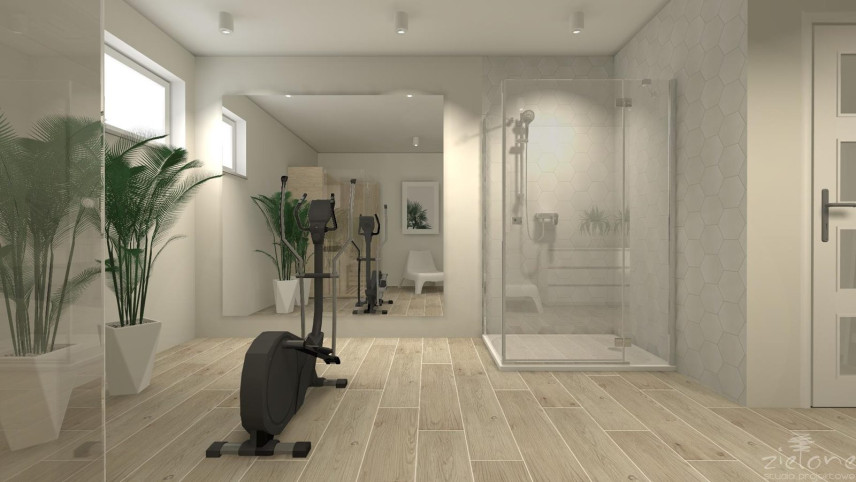 Duża łazienka z prysznicem, stepperem fitness oraz sauną
