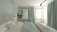 Projekt sypialni z niebieskim kolorem ścian oraz szarym łóżkiem  kontynentalnym