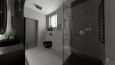 Projekt łazienki z prysznicem oraz oknem w ciemnych barwach