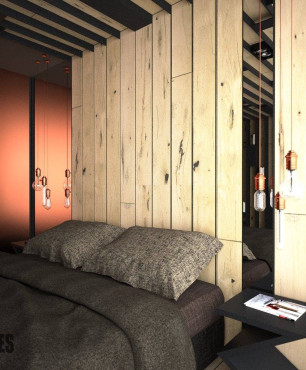 Projekt sypialni z drewnem na ścianie za  łóżkiem kontynentalnym