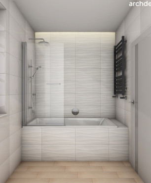 Klasyczna łazienka z wanną w zabudowie z funkcją prysznica, dzięki szklanemu parawanowi