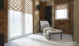 Projekt dużej łazienki z sauną oraz rattanowym leżakiem