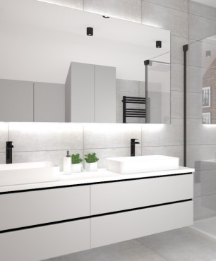 Projekt łazienki z białą szafką wiszącą, z dwoma umywalkami nablatowymi, prysznicem, dużym lustrem prostokątnym oraz jedną ścianą z cegły