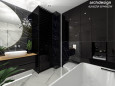 Projekt biało-czarnej łazienki z owalną umywalką nablatową oraz czarną szafką wiszącą