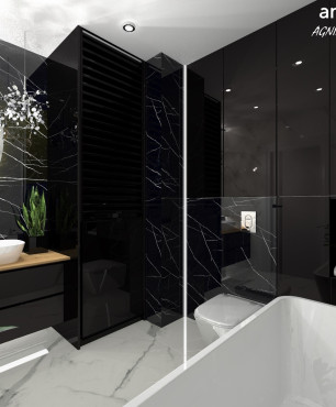 Projekt biało-czarnej łazienki z owalną umywalką nablatową oraz czarną szafką wiszącą