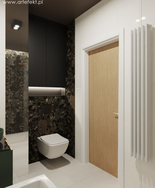 Łazienka z białą muszlą wiszącą, czarnym kolorem ścian oraz jasnymi płytkami na podłodze