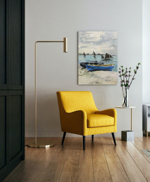Salon z żółtym fotelem oraz obrazem na płótnie