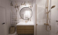 Nowoczesna łazienka z białymi płytkami z beżową żyłką na ścianie