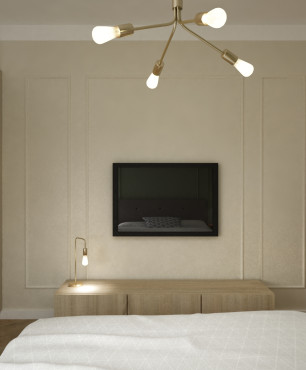 Sypialnia z szafą z lustrem, szafką RTV, telewizorem na ścianie oraz łóżkiem