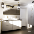 Łazienka z dwoma umywalkami oraz armaturą w złotym kolorze