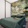 Sypialnia z kontynentalnym łóżkiem oraz tapetą na ścianie