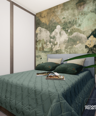 Sypialnia z kontynentalnym łóżkiem oraz tapetą na ścianie