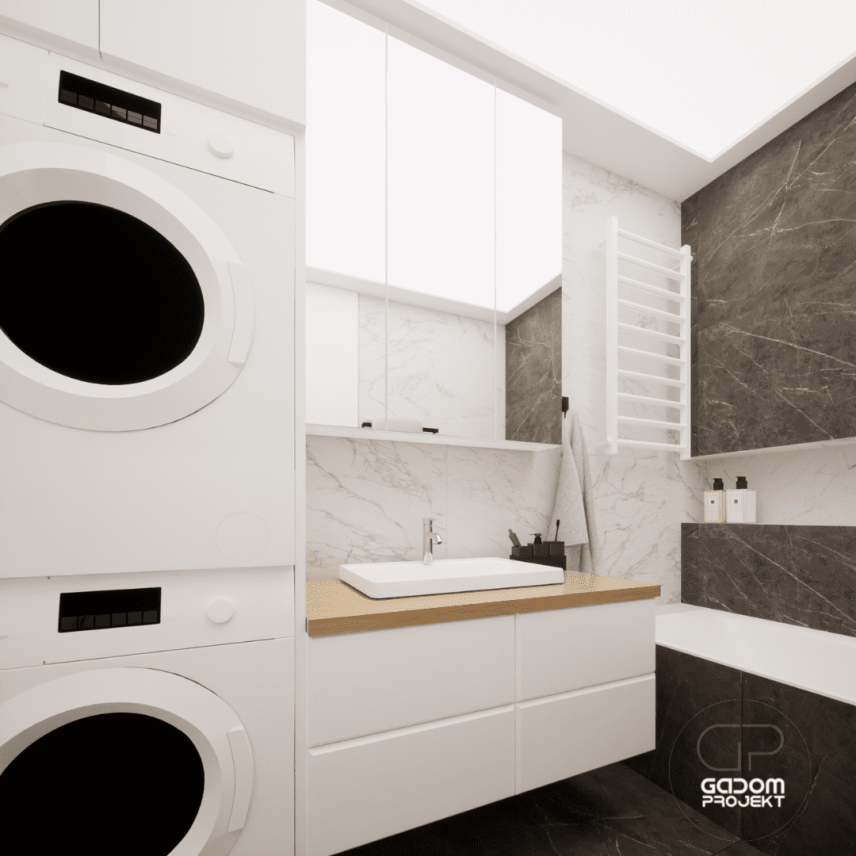 Projekt łazienki z białą szafką wiszącą z drewnianym blatem, suszarką bębnową oraz pralką