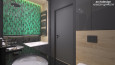 Łazienka z zielonymi płytkami na ścianie