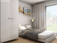 Sypialnia z białą cegłą na ścianie