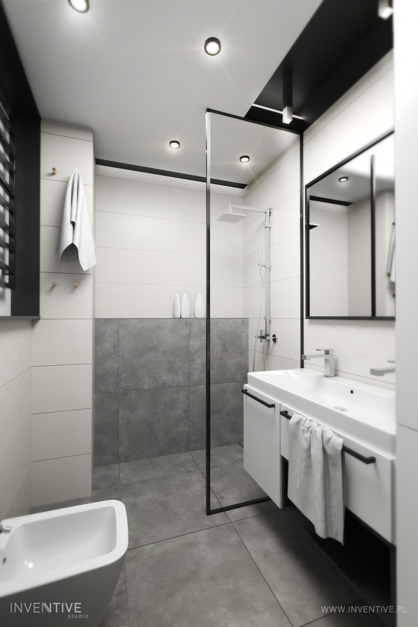 Szaro-biała łazienka z czarnymi dodatkami