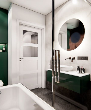 Łazienka z zielonymi szafkami w stylu loft