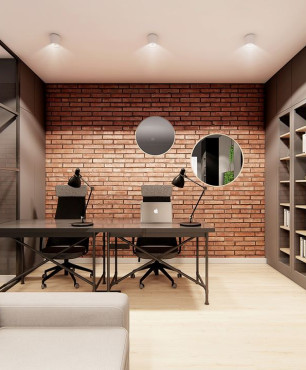Biuro w stylu loft z cegłą na ścianie