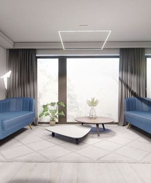 Salon z niebieskimi sofami
