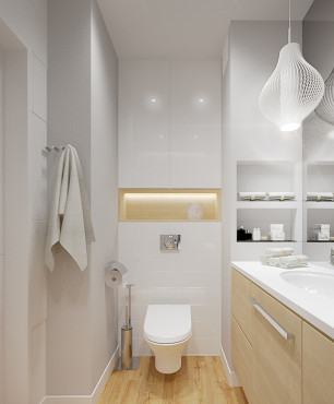 Biała łazienka ze stylową lampą