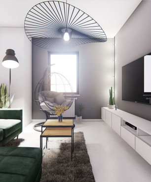 Salon z telewizorem i zielonym narożnikiem