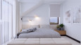 Biała sypialnia  z szarym łóżkiem z zagłówkiem