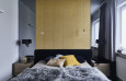 Aranżacja sypialni z żółtą ścianą