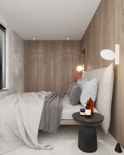 Mała sypialnia z drewnianymi panelami na ścianie