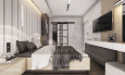 Sypialnia z drewnianym łóżkiem kontynentalnym i telewizorem na ścianie