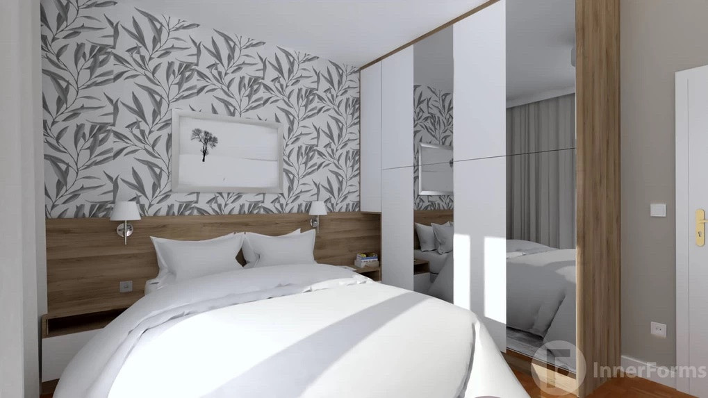 Sypialnia z drewnianym łóżkiem kontynentalnym i jasną tapetą na ścianie