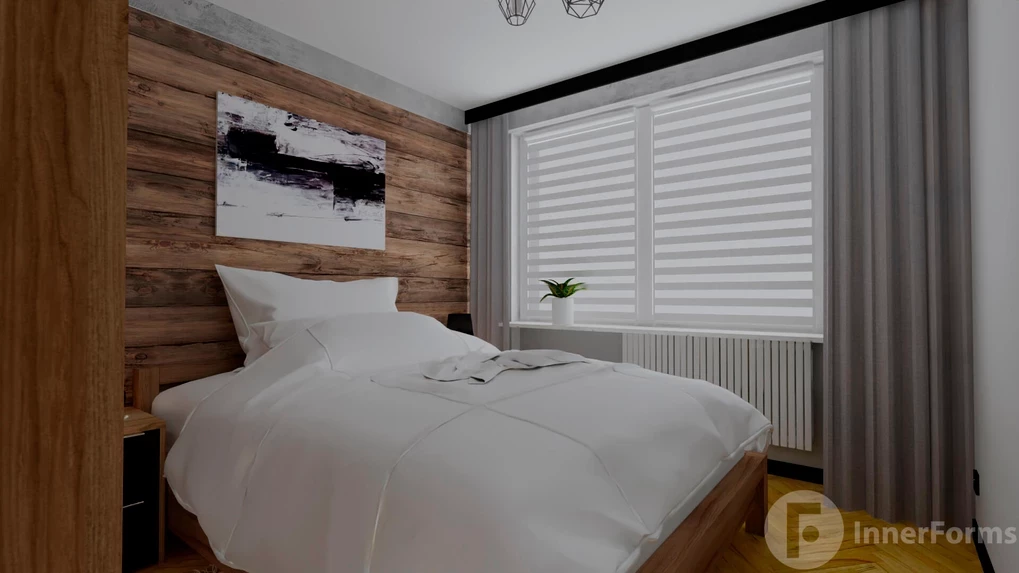Sypialnia z drewnianą ścianą za łóżkiem kontynentalnym