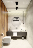Łazienka z białą muszlą wiszącą i okrągłym lustrem