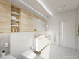Przestrzenna łazienka z drewnianymi meblami w zabudowie