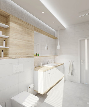 Przestrzenna łazienka z drewnianymi meblami w zabudowie