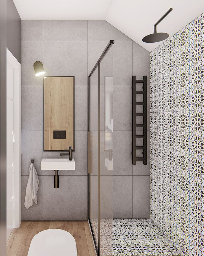 Aranżacja łazienki z szarymi płytkami i drewnianą podłogą