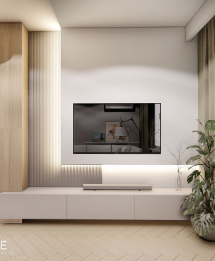 Salon z telewizorem na ścianie i z drewnianą szafką z półkami odkrytymi