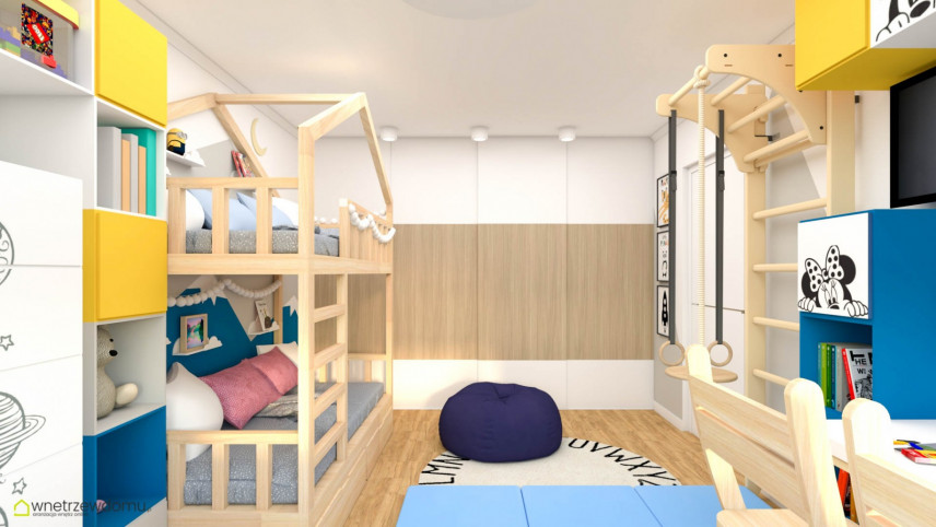 Aranżacja pokoju z drewnianym łóżkiem piętrowym