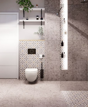 Łazienka z szara podłogą, przeplatana płytkami z czarno-białą mozaiką