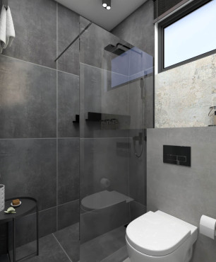 Łazienka z prysznicem typu walk - in z szarymi płytkami i z muszlą wiszącą